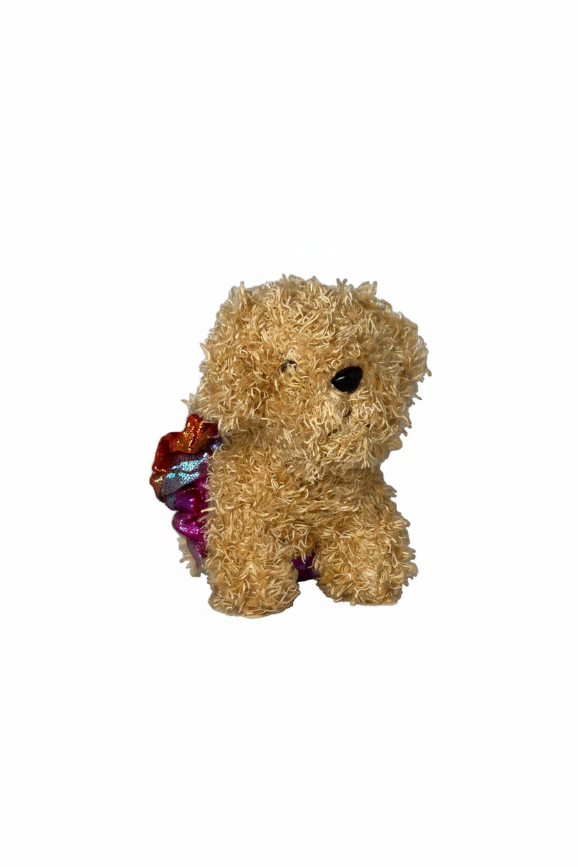 Brown 5-inch plush terrier wearing a tutu with soft fabric and detailed expression