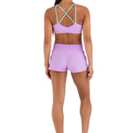Every Turn Aerobics Short in Lavender, back view showing elastic waistband and fitted athletic short