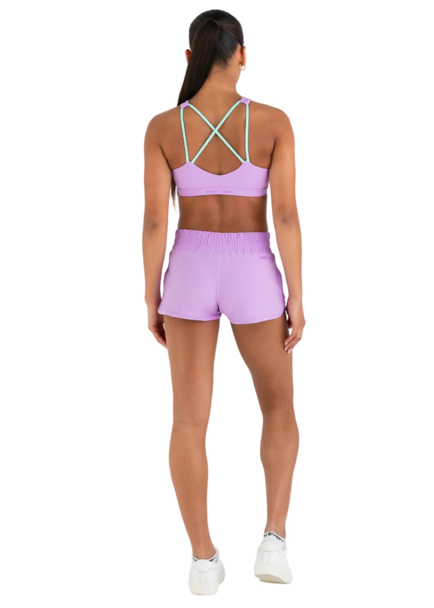 Every Turn Aerobics Short in Lavender, back view showing elastic waistband and fitted athletic short