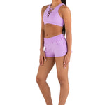 Every Turn Aerobics Short in Lavender, side view showing elastic waistband and fitted athletic short