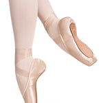 RP Collection Akoya Pointe Shoe in Pink, lifestyle view showing outsole and platform with satin upper en pointe