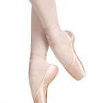 RP Collection Akoya Pointe Shoe in Pink, lifestyle view showing satin upper and vamp with ribbon wrap en pointe