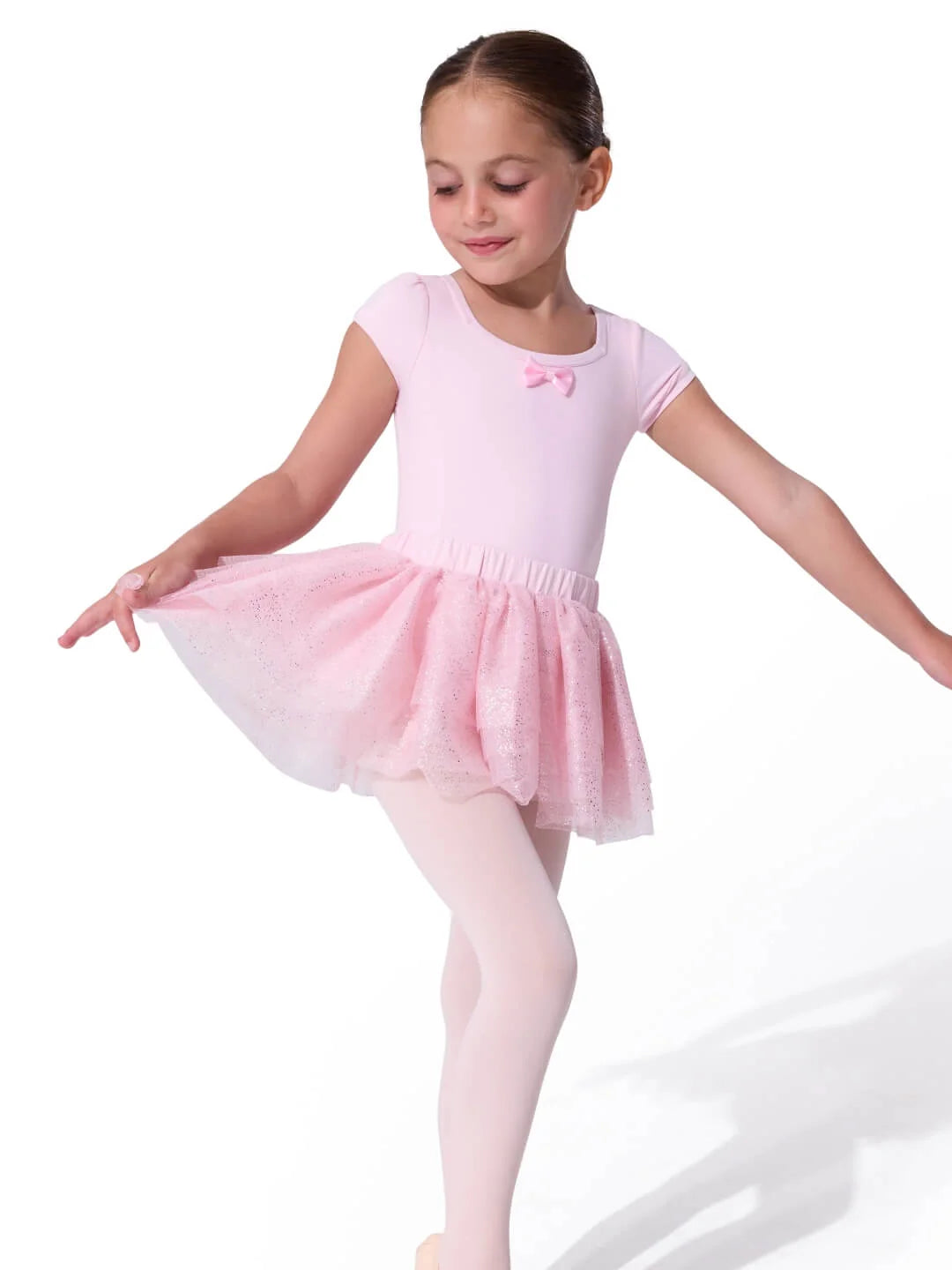 Capezio Ballet Tulle Skirt in Flushing Pink, lifestyle view showing multi-layer glitter tulle skirt with elastic waistband