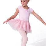 Capezio Ballet Tulle Skirt in Flushing Pink, lifestyle view showing multi-layer glitter tulle skirt with elastic waistband