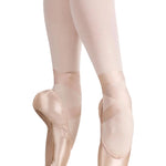 RP Collection Baroque Pointe Shoe Hard Shank in Pink, lifestyle view showing medial profile and tapered box en pointe