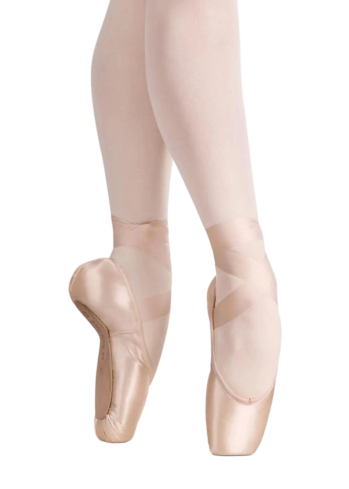 RP Collection Baroque Pointe Shoe Hard Shank in Pink, lifestyle view showing medial profile and tapered box en pointe