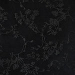 Bloch Veronica Halter Leotard in Black, fabric detail view showing tonal floral pattern with subtle shine