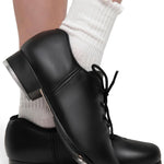Capezio Cadence Tap Shoe in Black, lifestyle view showing lace-up closure and Tele Tone taps