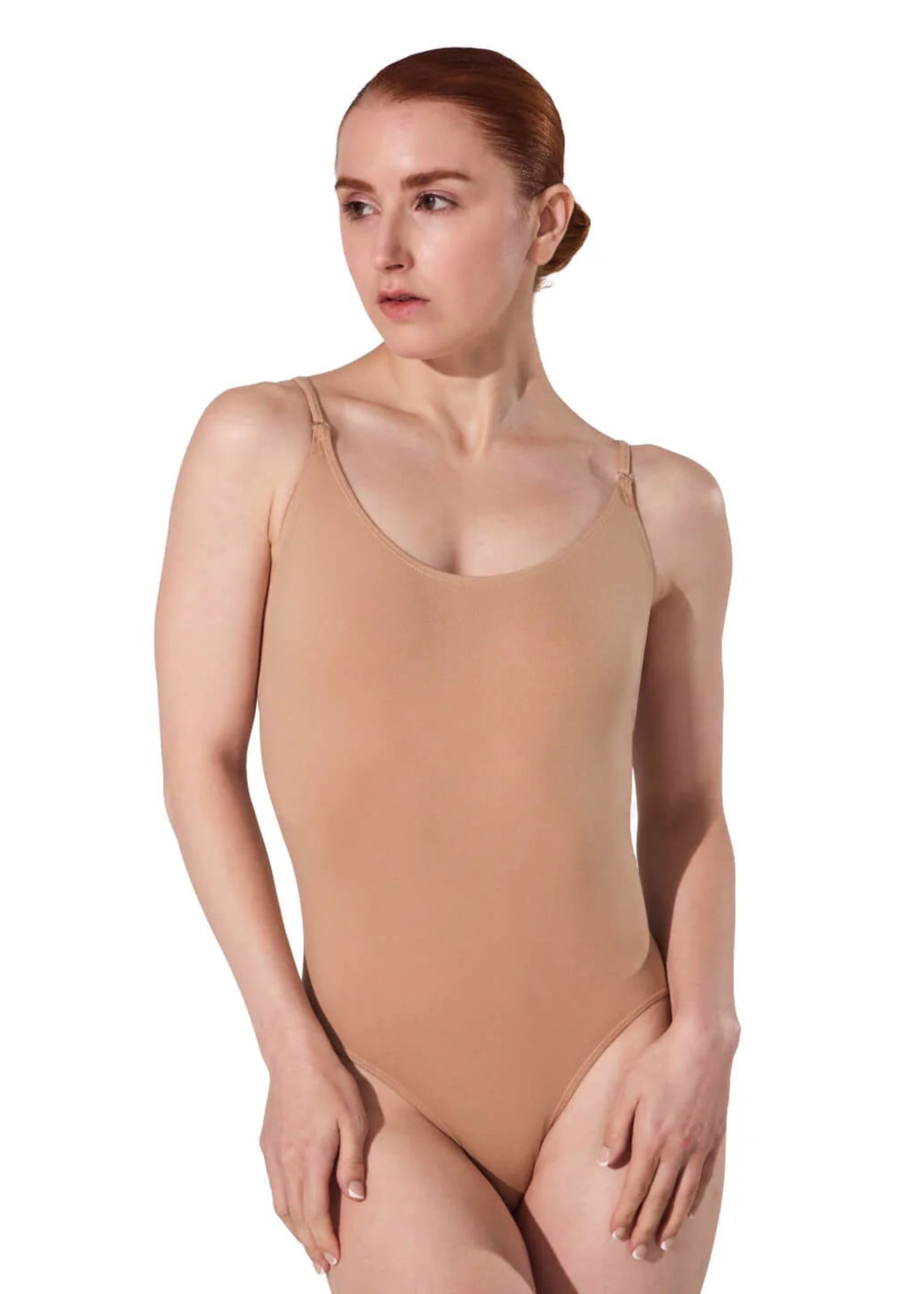 Capezio Seamless Cami Leotard in Nude, lifestyle view showing scoop front and jazz leg line
