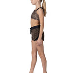 XO Dance Company Cheetah Breezy Flow Short in Cheetah, side view showing curved hem with black trim and waist tie