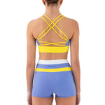 Every Turn Confidence Crop Top in Periwinkle & Sunflower, back view showing crisscross straps and open cutout