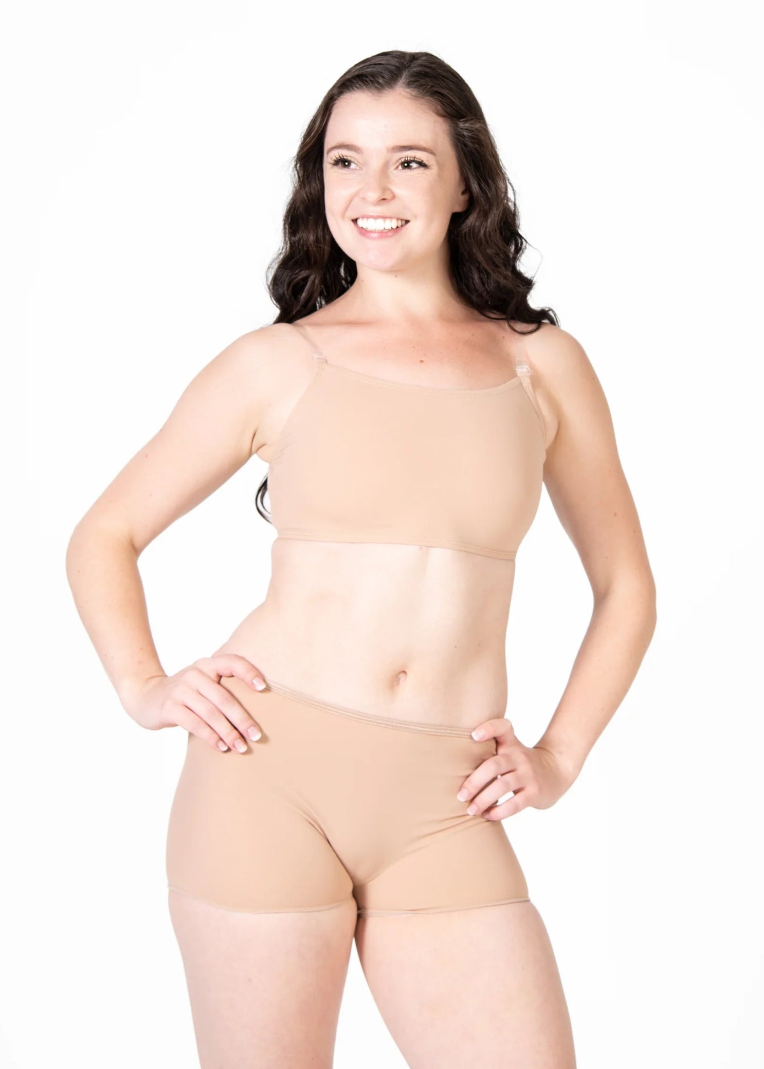 Body Wrappers Nylon Convertible Halter Cami Bra in Nude, front view showing scoop neckline and clear straps