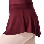 Capezio Curved Pull On Skirt in Burgundy, side view showing polyester fabric, side seam and curved hem