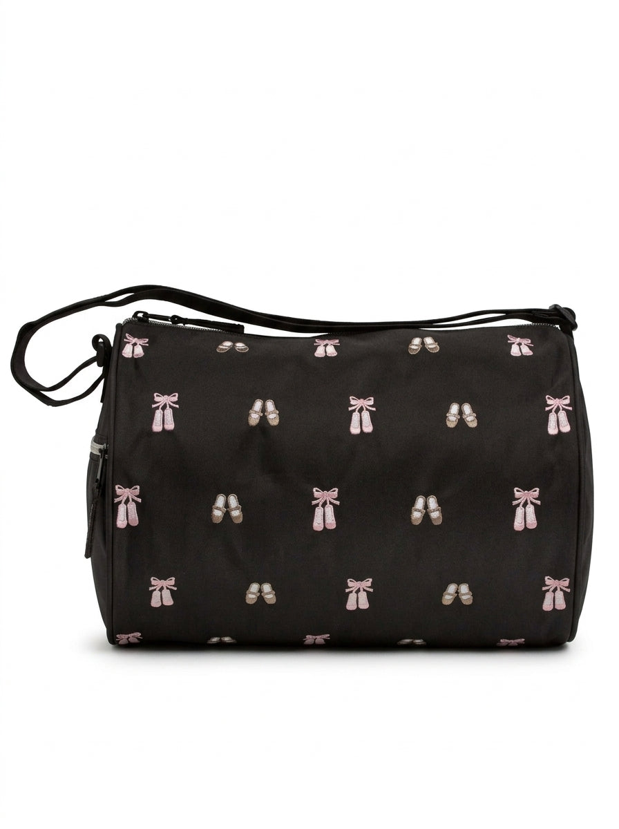 Horizon Designs Daisy Duffel in Black, front view showing ballet and tap shoe print and silver zip closure