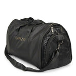 Capezio Dance Garment Duffle in Black, angled side view showing polyester exterior, gold logo lettering, and top handles