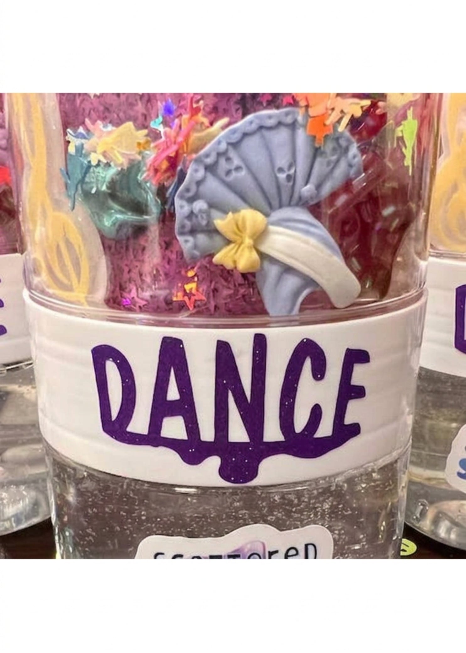 Scattered Slime Dance Slime Kit, front view showing clear jar, DANCE label and ballet costume charm