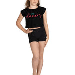Danznmotion Polyester/Rayon Dancer Heart Tee in Black, front view showing dancer heart print and cropped hem