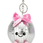 Iscream Polyester Disco Ball Bag Charm in Pink, front view showing embroidered smile and plush bow