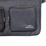 Rac n Roll Duffel with Built-In Rack in Black, detail view showing built-in rack system and compression straps