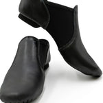 Capezio E-Series Slip-On Jazz shoe in Black, front view showing pair with slip-on silhouette