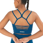 Every Turn Empowered Long Line Crop Top in Dark Ocean, back detail view showing crossed straps and ladder cutouts