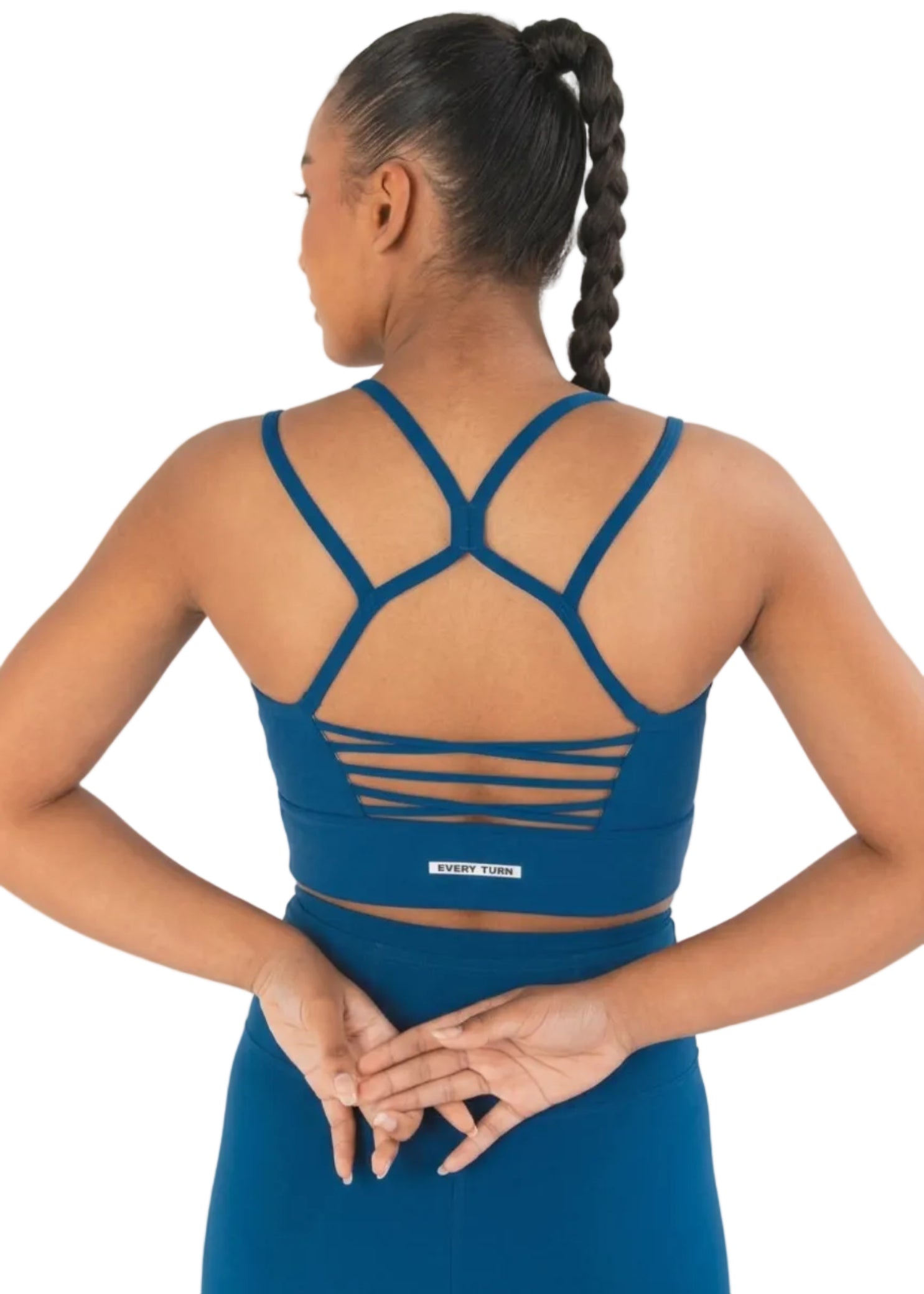 Every Turn Empowered Long Line Crop Top in Dark Ocean, back detail view showing crossed straps and ladder cutouts
