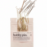 Kitsch Essential Bobby Pins in Gold, front view showing 45-count gold pins in clear resealable retail pouch