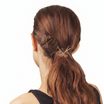 Kitsch Essential Bobby Pins in Gold, lifestyle view showing gold pins securing a low ponytail