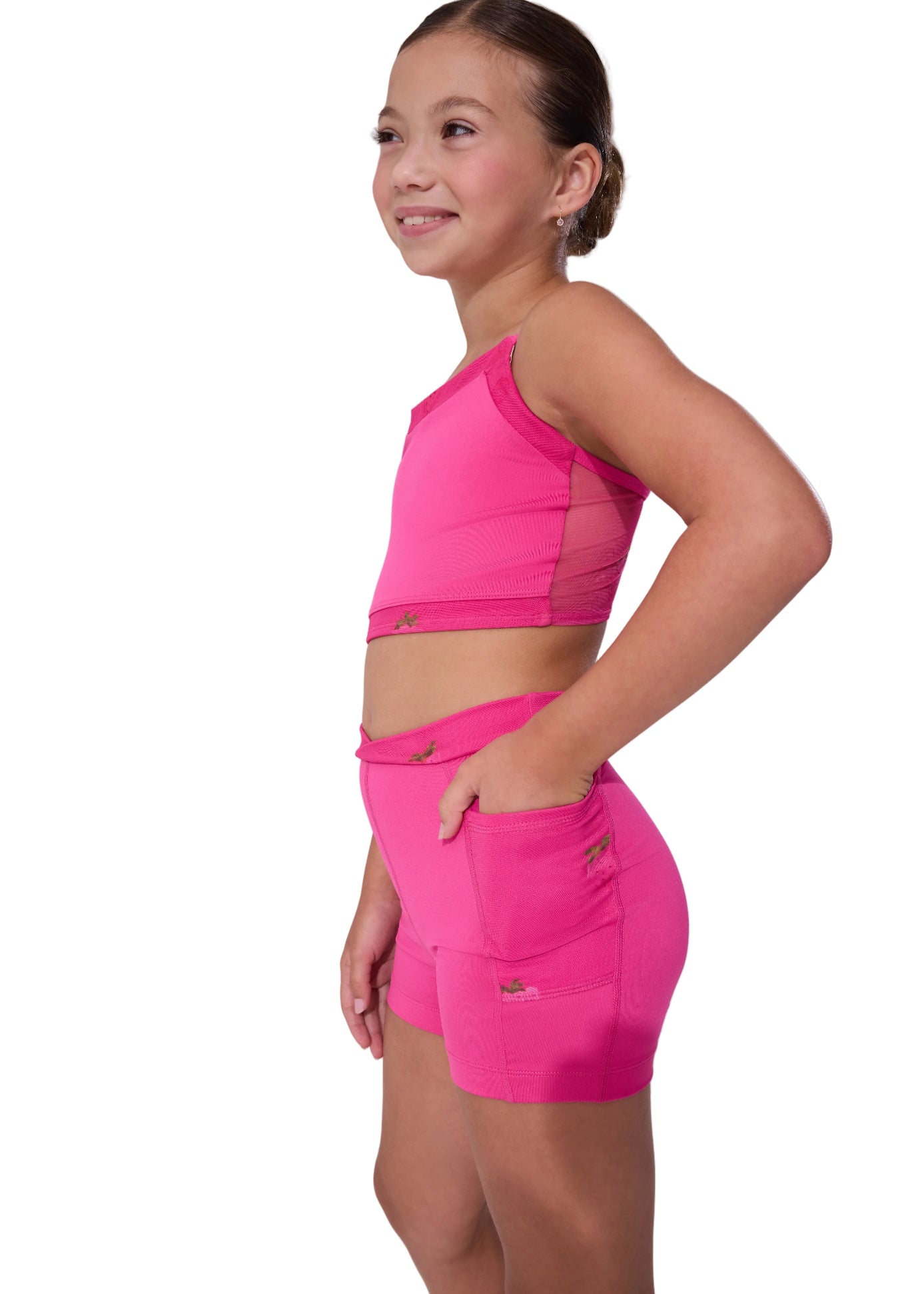 Capezio Berry Cute Top in Bright Pink, side view showing cropped bra silhouette with spaghetti straps and straight hem