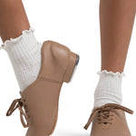 Capezio Fluid Tap Shoe in Caramel, lifestyle view showing lace-up closure and Tele Tone taps