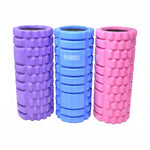 Superior Stretch foam fitness roller, collection view showing all three colors — Purple, Blue, and Pink — with dual-zone grid texture and solid-core hollow-center construction on white background