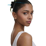 Hally Hair Glitter Hair Shade Stix in Blue, lifestyle view showing sparkling streaks in hair