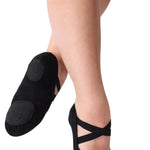 Capezio Hanami canvas ballet shoe in Black, outsole view showing split-sole construction and elastic