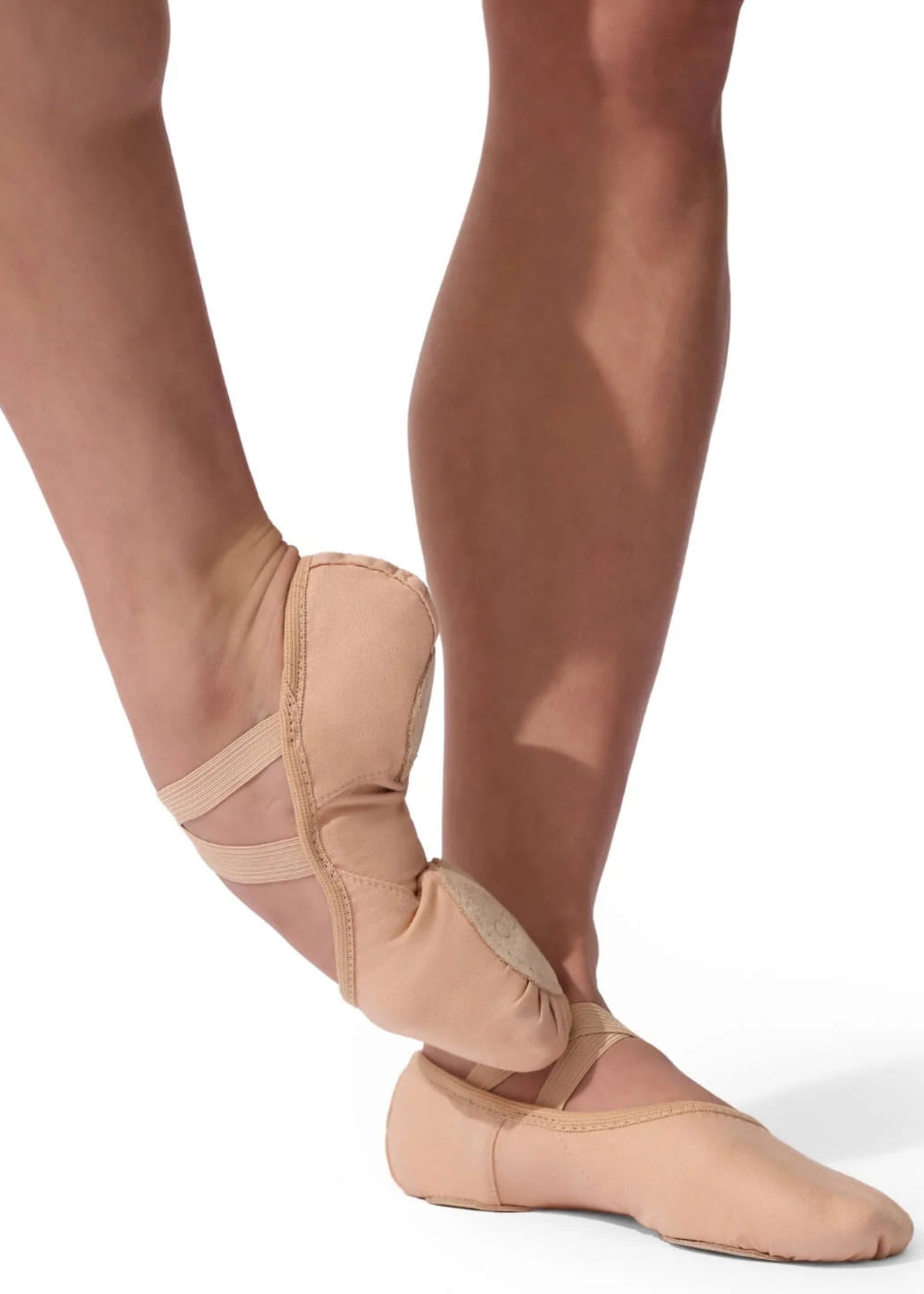Capezio Hanami canvas ballet shoe in Nude, side view showing cross elastic straps and canvas upper
