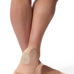 Capezio Hanami canvas ballet shoe in Nude, side view showing heel pad, canvas upper and cross elastic
