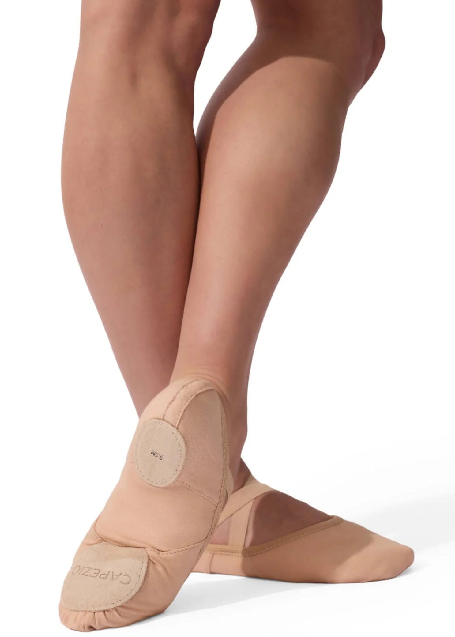 Capezio Hanami canvas ballet shoe in Nude, side view showing heel pad, canvas upper and cross elastic
