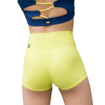 Tiger Friday Hot Cross Shorty in Butter, back view showing crossover waistband and full-coverage fit