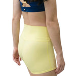 Tiger Friday Hot Cross Shorty in Butter, side view showing fitted shorts and crossover waistband