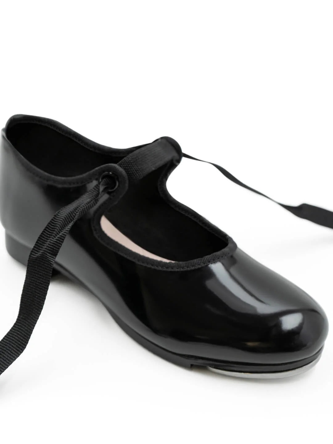 Capezio Jr. Tyette Tap Shoe in Patent Black, angled front view showing grosgrain ribbon tie and Tele Tone taps