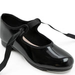 Capezio Jr. Tyette Tap Shoe in Patent Black, angled front view showing grosgrain ribbon tie and Tele Tone taps
