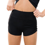 Tiger Friday Leggy Shocks in Black, front view showing footless dance tights with stirrup detail