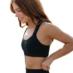 Tiger Friday Let It Slide Crop in Black, side view showing cropped dance top with off-shoulder neckline