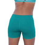 Tiger Friday Low Rider Shorties in Emerald, back view showing fitted dance shorts with crossover waistband