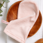 Yofi Cosmetics Knitted Microfiber Magic Mitt, lifestyle view showing reusable water-only cleansing cloth