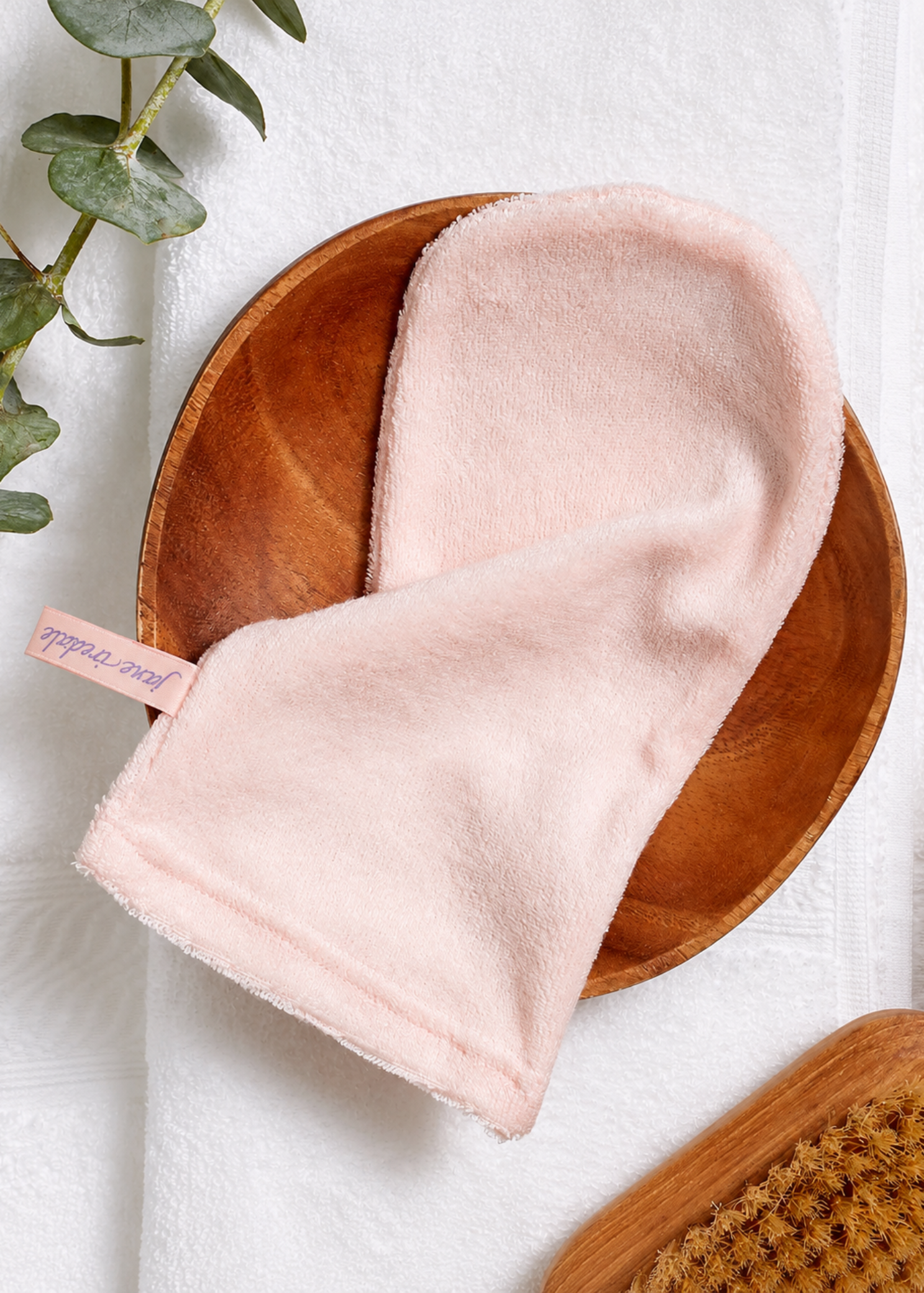 Yofi Cosmetics Knitted Microfiber Magic Mitt, lifestyle view showing reusable water-only cleansing cloth