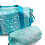 Capezio Metallic Star Duffle in Metallic Turquoise, detail view showing bag contents and included accessories