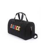 Dasha Designs Multi Dance Duffel in Black, angled side view showing multi-color chenille DANCE lettering and gold hardware