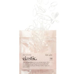 Kitsch No-Snag Elastics in Clear, detail view showing clear coil hair tie construction and texture