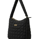 Ooh La La On The Move Puffer Tote in Black, side view showing quilted grid exterior and padded shoulder strap