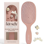 Kitsch Paddle Brush in Terracotta, front view showing terracotta handle and cushioned bristle base